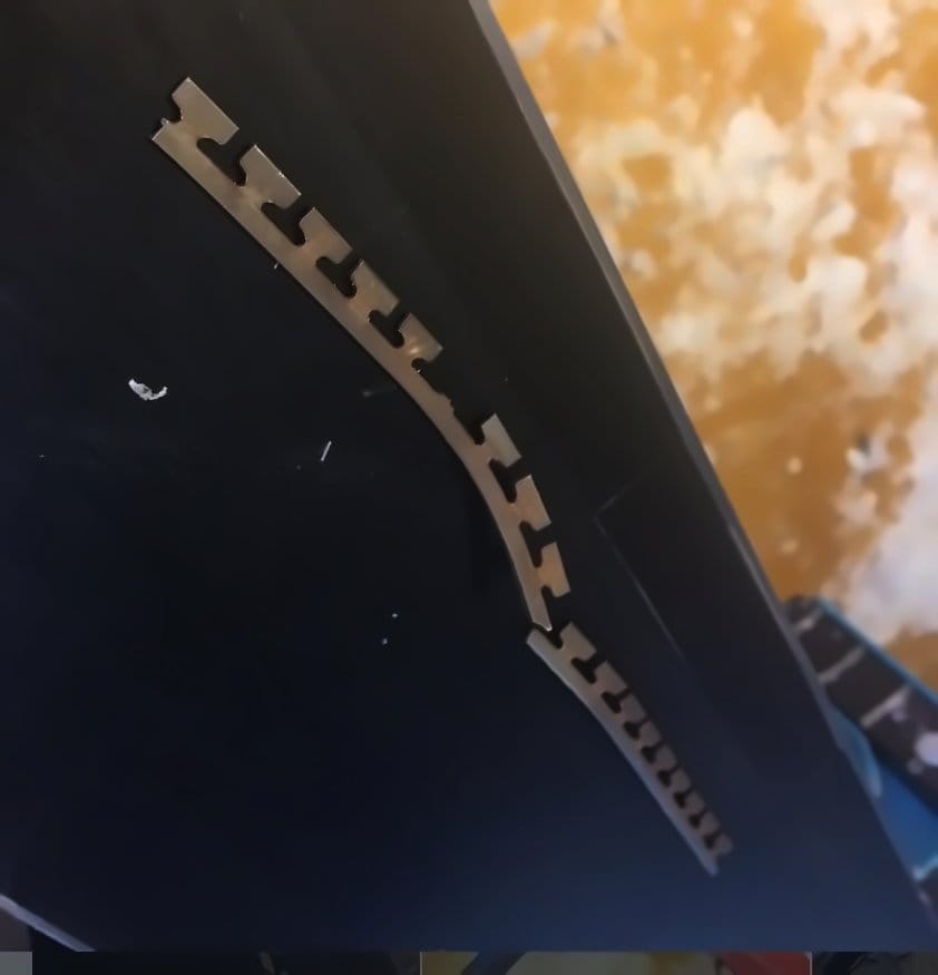 New steel edge section fitted to a ski during an edge replacement