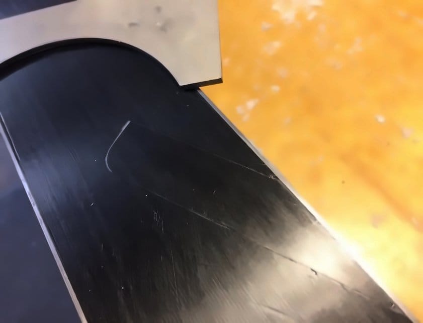 Close-up of a completed base patch on a ski
