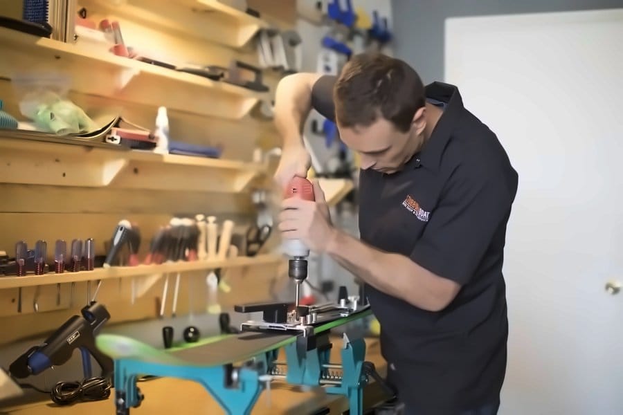 Drilling a ski for a binding mount