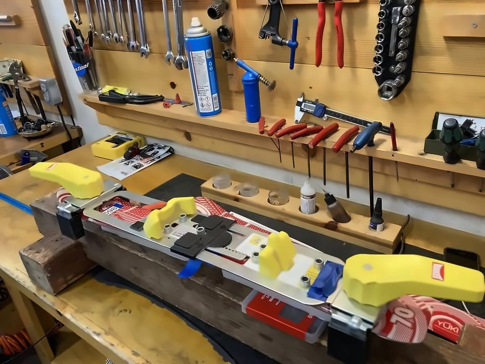 Binding mounting jig set up on the workbench